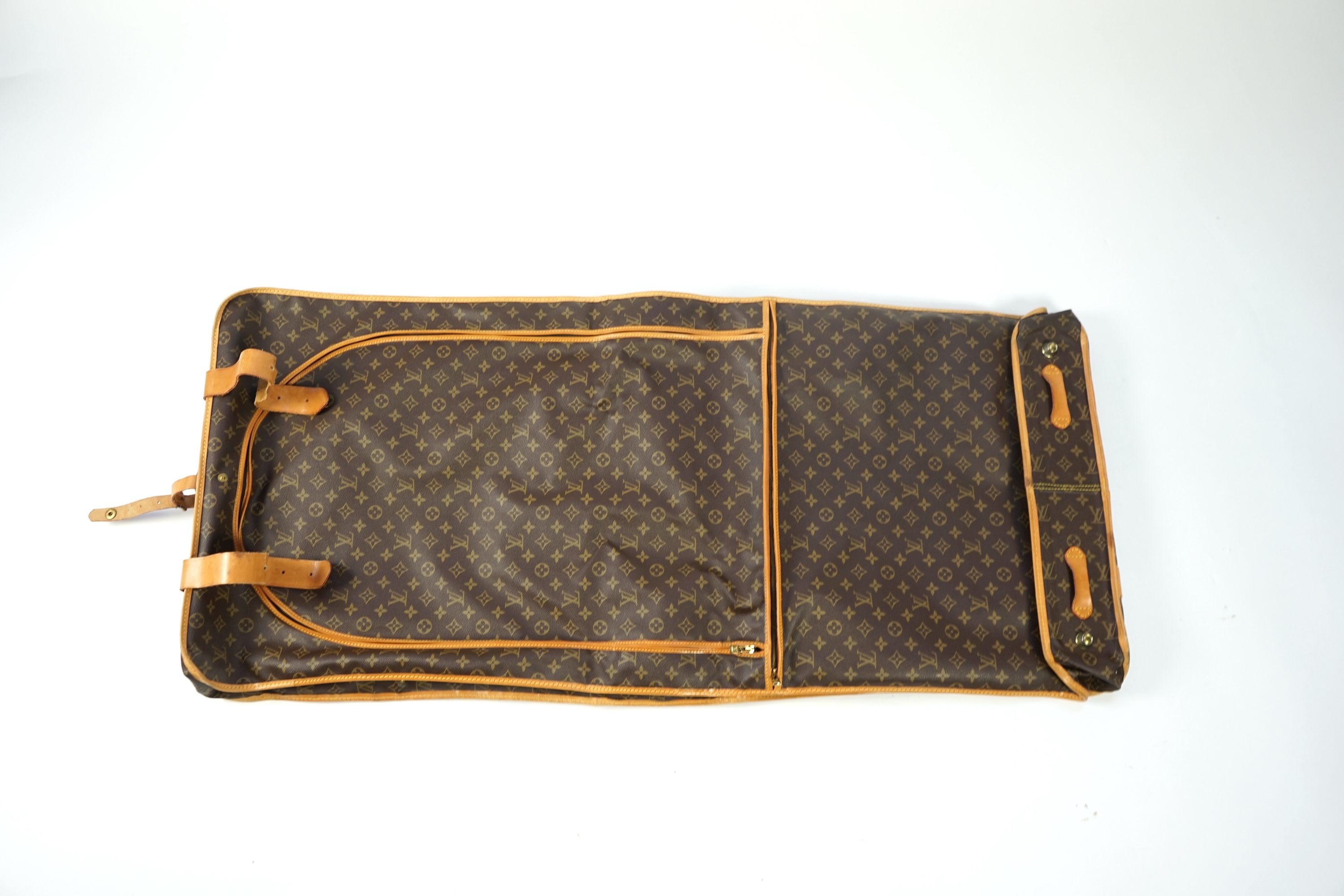 A Louis Vuitton monogram canvas and leather travel bag, 60cm x 53cm x 20cm closed